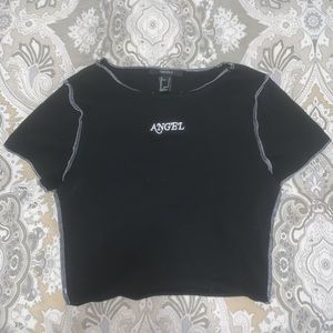 Small F21 black crop top with outside stitching